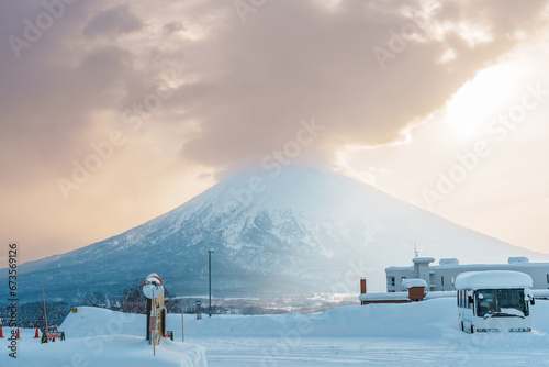 Beautiful Yotei Mountain with Snow in winter season at Niseko. landmark and popular for Ski and Snowboarding tourists attractions in Hokkaido, Japan. Travel and Vacation concept photo
