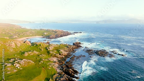 Ineuran Bay coast and cliffs, Malin Head, Ireland's northernmost point, famous Wild Atlantic Way, spectacular coastal route. Wonders of nature. Numerous Discovery Points. Co. Donegal photo