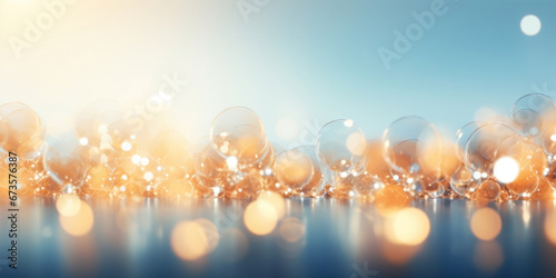 Abstract glowing Christmas background with golden and blue spheres photo