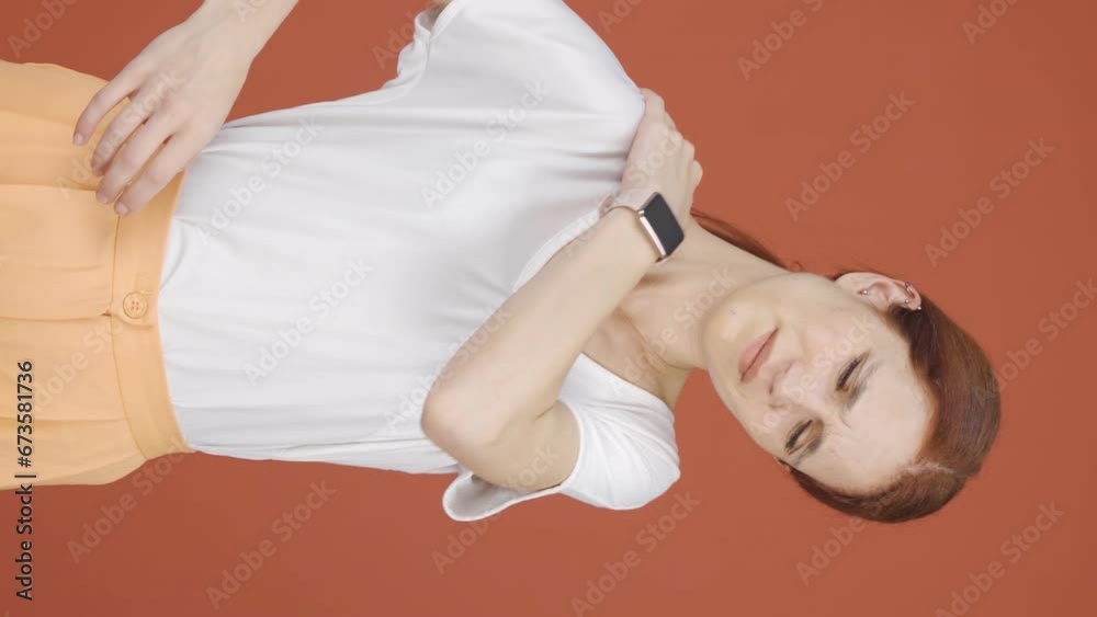 Vertical video of Woman with shoulder pain. Vertical video of Woman with shoulder pain.