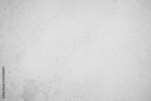 Concrete or stone texture for background in black, grey and white colors. Cement and sand wall of tone vintage grunge outdoor polished concrete texture. Building rough pattern floor decorating empty. © Manitchaya
