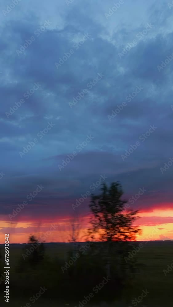 Dawn and dramatic sky, sun, Vertical Dawn and dramatic sky, sun, Vertical