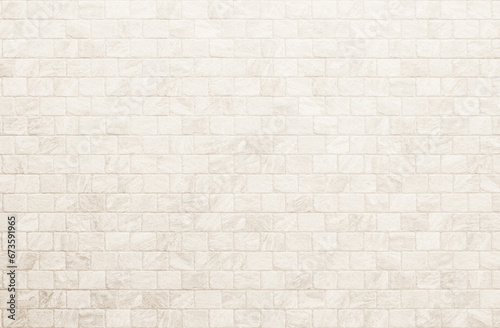 Empty background of wide cream brick wall texture. Beige old brown brick wall concrete or stone textured  wallpaper limestone abstract flooring. Grid uneven interior rock. Home decor design backdrop.