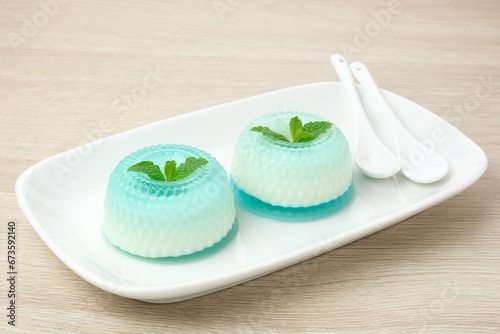 Silky sweet lychee pudding topped with mint leaves. 