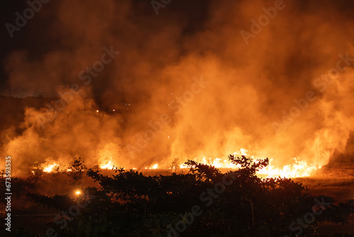 Wildfire Burning in the Distance on a Dark Night