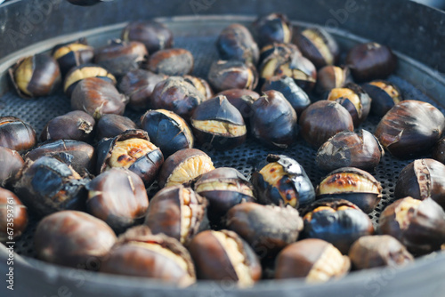 traditional Istanbul street food grilled chestnuts in a row