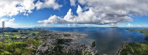 Panoramic view over Surigao City and Surigao Strait towards the island of Dinagat.  photo