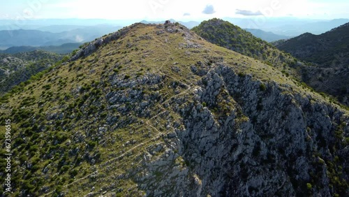 Limestone Rock Mountains Of Sv. Paskal In Dalmatian Coast, Croatia. Aerial Drone Shot photo