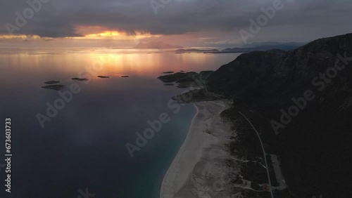 Drone footage of Langsanden Beach in sunset, Sandhornøy, Bodø, Norway photo