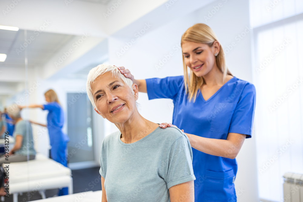 Licensed chiropractor or manual therapist doing neck stretch massage to relaxed female patient in clinic office. Young woman with whiplash or rheumatological problem getting professional doctor's help