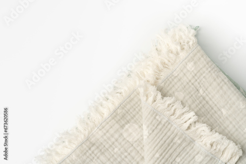 Gray muslin blanket for kids on white background