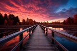 Colorful autumn sky background with a wooden footbridge