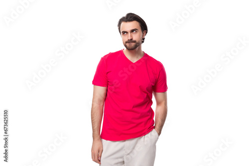 young black-haired european man dressed in red corporate t-shirt with logo print mockup © Ivan Traimak
