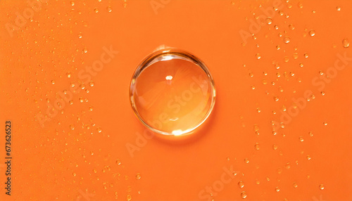 Detailed Water Droplet on an Orange Backdrop