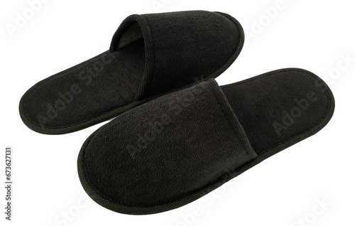Soft black home or spa slippers isolated on white background with clipping path. Blank, no label, mock up for your design logo. Black hotel slippers or sandals.