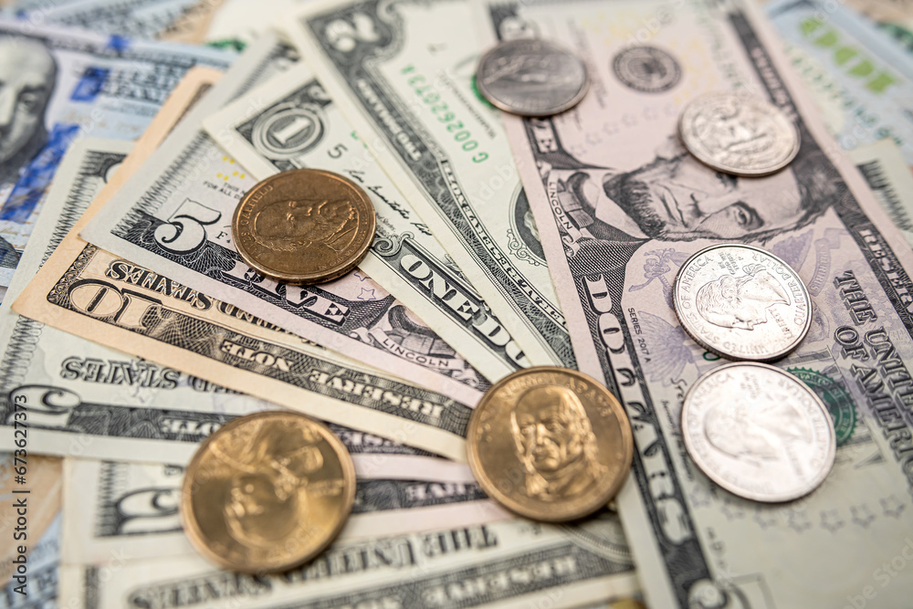 background of ste different us dollar paper money and coin cent background of ste different us dollar paper money and coin cent