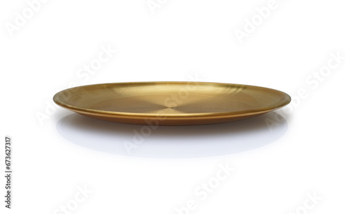 Front view of golden plate isolated on white background. Empty gold round flat plate with shadow. Mock up template for food poster design.