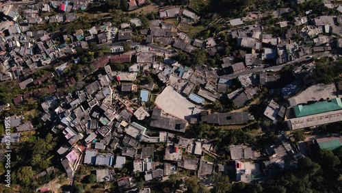 Aerial Top view of Gopeshwar City, Uttarakhand, India. Drone view of a developed city situated in a hilly area. photo