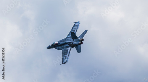 Bild auf Leinwand FA-18 Super Hornet with vapor and afterburner