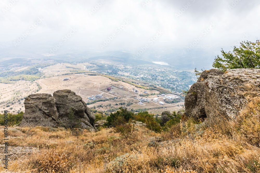 Naklejka premium Mysterious mountain landscape of the Valley of Ghosts, a cluster of strangely shaped rocks on the western slope of Mount Demerdzhi in Crimea