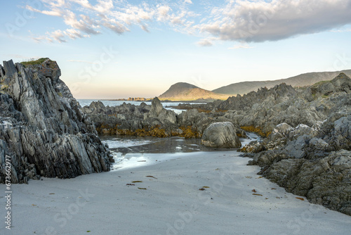 Beautiful summer evening on a beach by the Barents Sea in Northern Norway photo