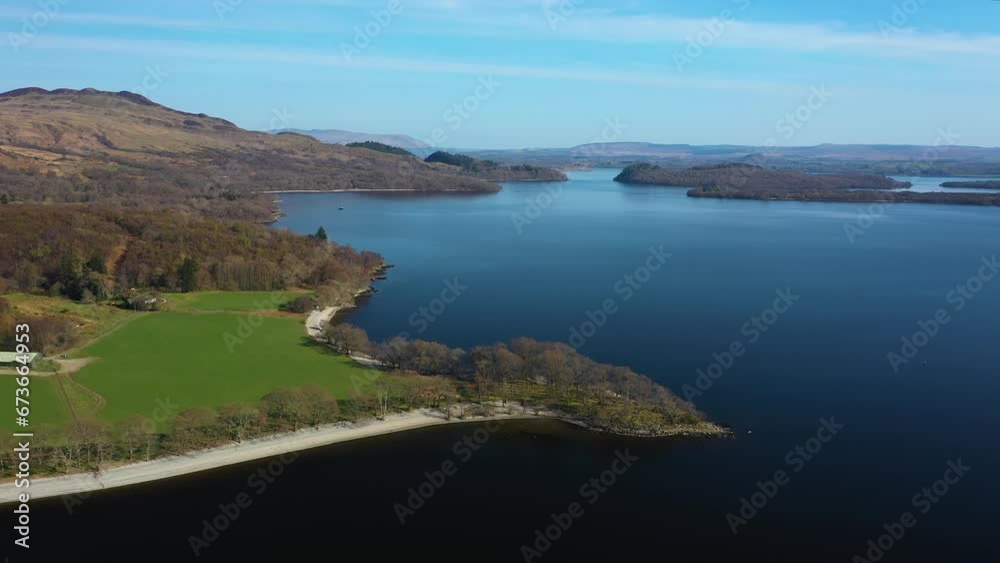 Aerial Flight Over Coast Of Loch Lomond, Scotland. Scottish Highlands. Aerial Flight Over Coast Of Loch Lomond, Scotland. Scottish Highlands.
