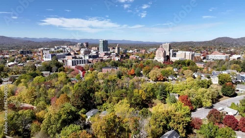 asheville nc, north carolina aerial push in in fall to skyline photo