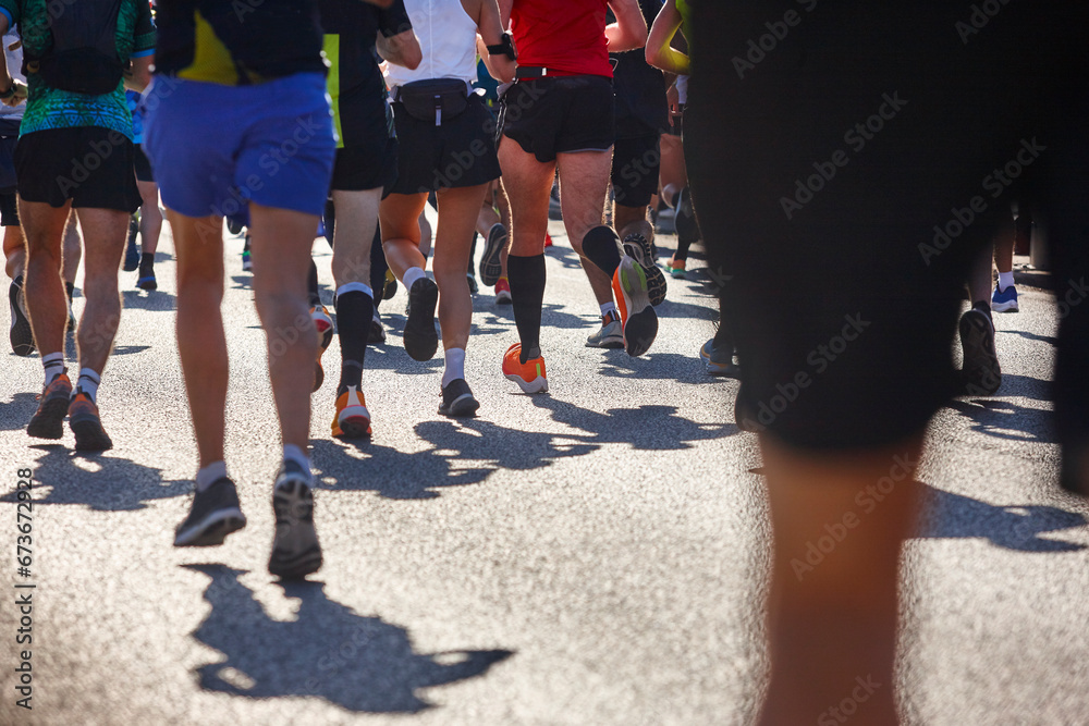 Runners on the street. Healthy lifestyle. Marathon. Athletics Runners on the street. Healthy lifestyle. Marathon. Athletics