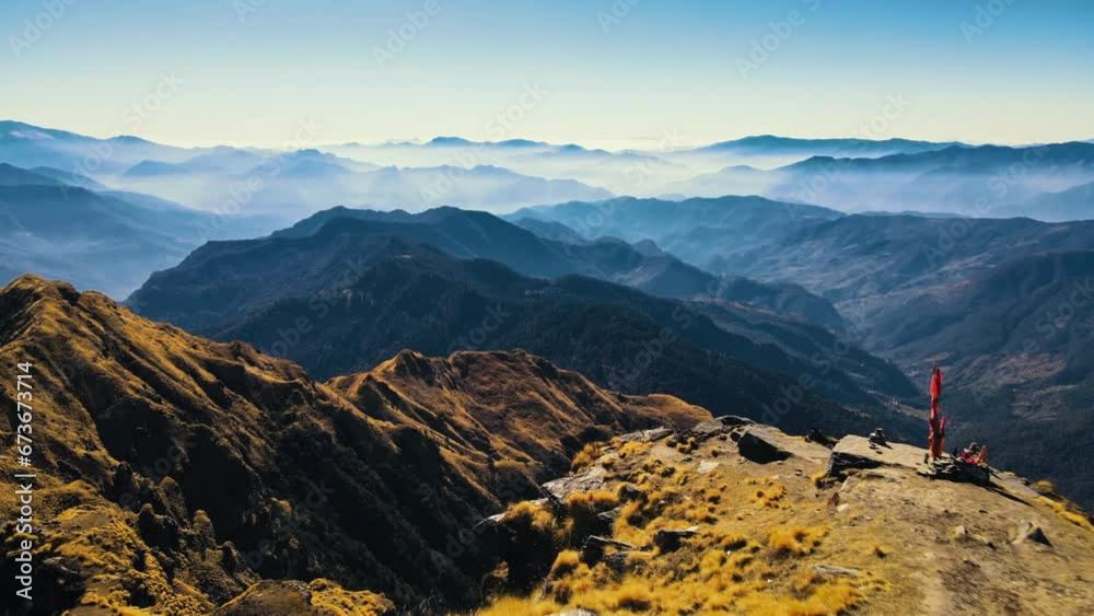 Aerial view of Mountains valley near Chopta, Tungnath in Uttarakhand, India. Foothills of Himalaya. Alps mountain scenic beauty in the evening. Aerial view of Mountains valley near Chopta, Tungnath in Uttarakhand, India. Foothills of Himalaya. Alps mountain scenic beauty in the evening.