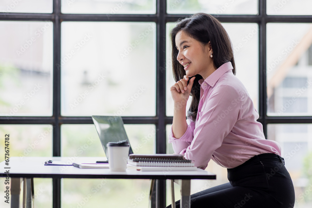 Business asian woman using calculator for do math finance in the office and business working background, tax, accounting, statistics and analytic research concept Business asian woman using calculator for do math finance in the office and business working background, tax, accounting, statistics and analytic research concept
