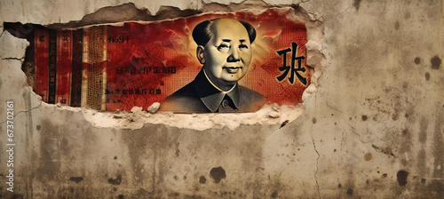 The concept of the Chinese economic crisis and recession tied to the real estate market crisis, with the image of Mao Zedong from the 100 yuan banknote on a crumbling wall. photo
