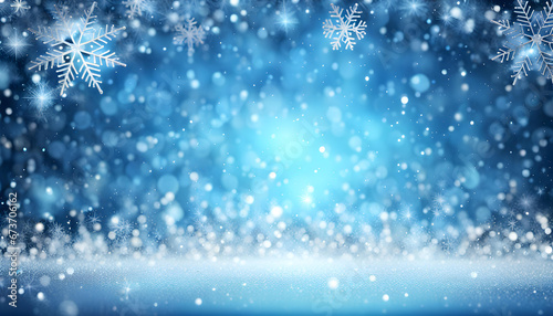 Blue sparkling Christmas and winter background with white snowflakes 