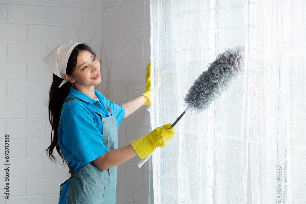 Professional housekeeper services company team working at customer house to clean up the floor, maid worker using mop wipe cleaning the dust, small business partnership female working together Professional housekeeper services company team working at customer house to clean up the floor, maid worker using mop wipe cleaning the dust, small business partnership female working together