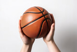 basketball in hand On white background
