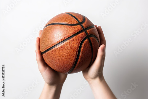 basketball in hand On white background