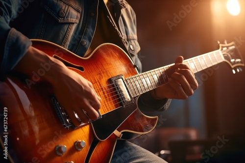 Close-up of an electric guitar in the hands of a man