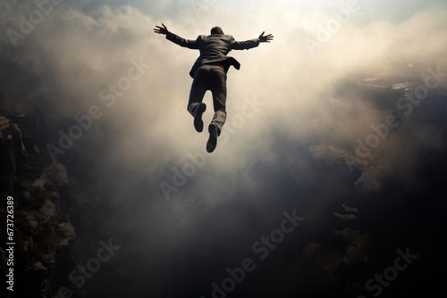 a man is flying high in the sky, dressed in a business suit, dark dramatic background, top view behind