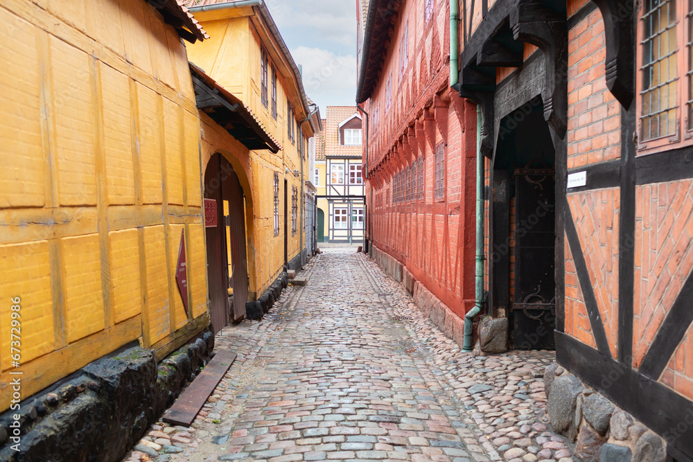 Odense, Denmark - October 21, 2023: Alley where the history museum of the city of Odense is located on the corner of Overgade 48. Odense, Denmark - October 21, 2023: Alley where the history museum of the city of Odense is located on the corner of Overgade 48.