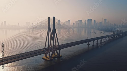 Cinematic aerial view of traffic passing over Bandra Worli Sea Link in Mumbai, India in the morning. Sunrise View of the sea bridge 
