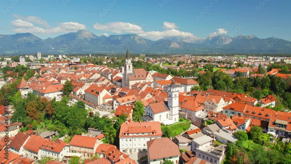 Aerial view of the Kranj old town with mountain range at background, Slovenia.