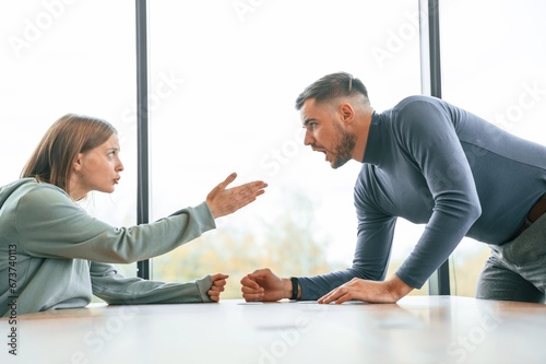 Man is screaming at his girlfriend, conception of quarrel