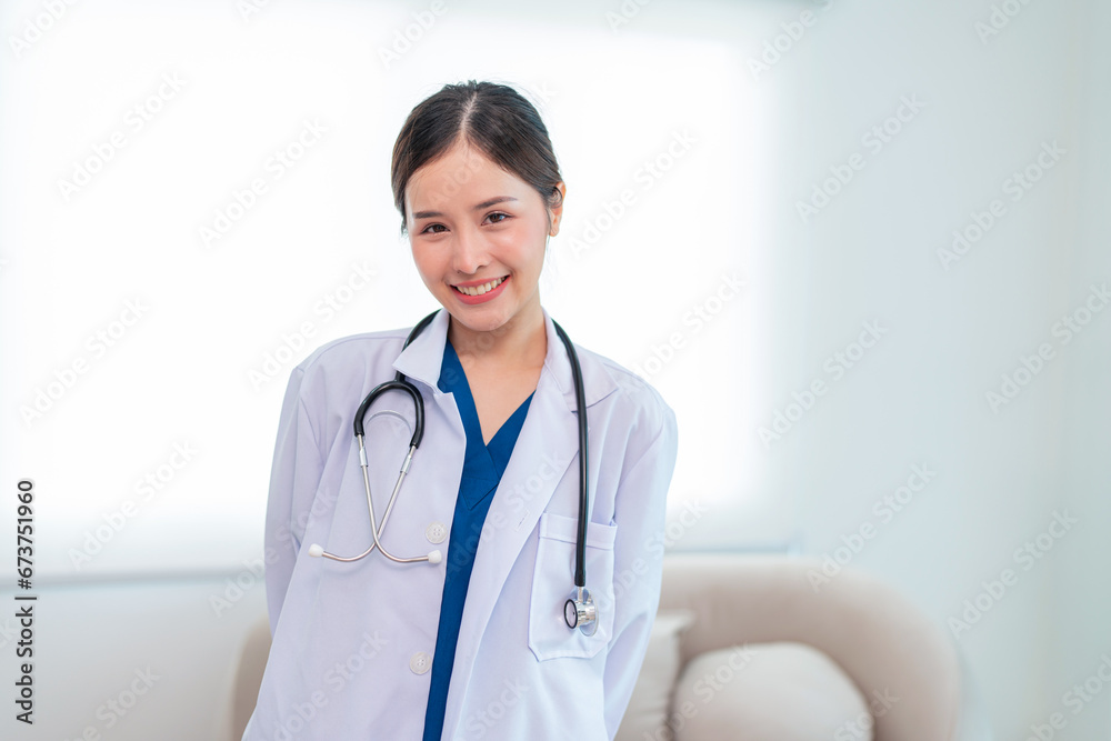 Portrait of Mature Female Doctor Wearing white Coat with Stethoscope Standing in Hospital Corridor. Concept Of Medical Technology and Healthcare Business. Portrait of Mature Female Doctor Wearing white Coat with Stethoscope Standing in Hospital Corridor. Concept Of Medical Technology and Healthcare Business.