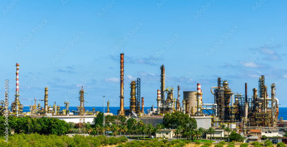 Fototapeta premium oil refinery facroty, recycle of oil and petroleum in green outdoor nature