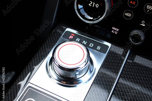 Картината върху платно Close up of the automatic gearbox lever, black interior car, Automatic transmission gearshift stick