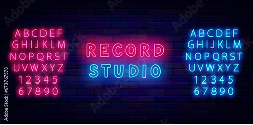 Record studio neon label. Music on air. Online streaming. Shiny pink and blue alphabet. Vector stock illustration