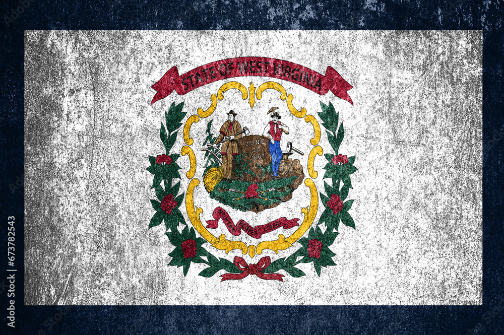 Close-up of the West Virginia grunge state flag. Dirty West Virginia state flag on a metal surface.