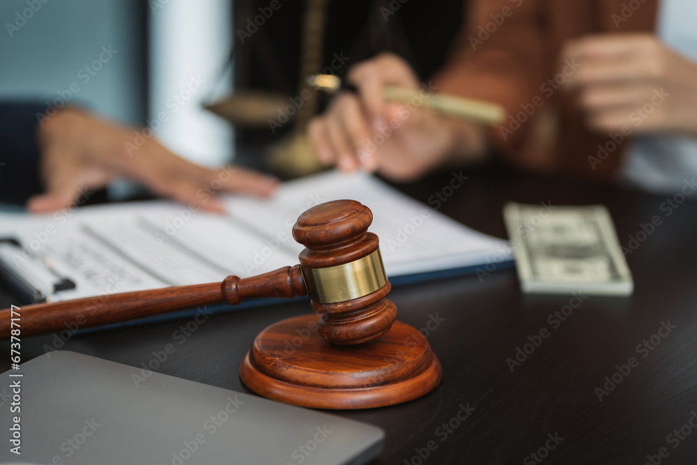 Legal counsel presents to the client a signed contract with legal law. Legal counsel presents to the client a signed contract with legal law.