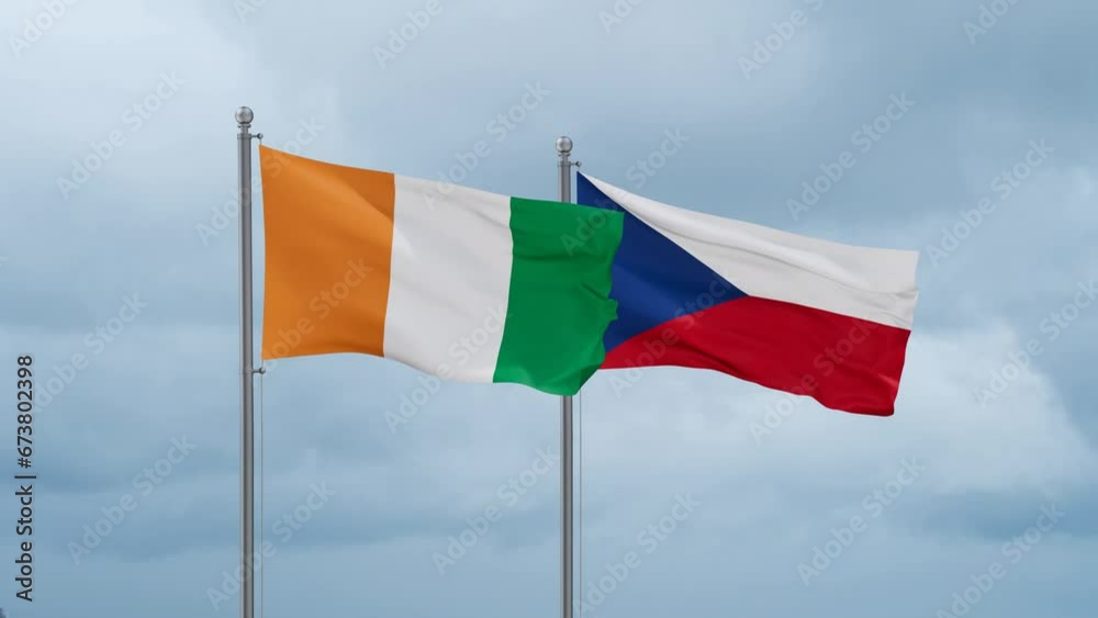 Czech Republic flag and Ivory Coast, Cote d'Ivoire flag waving together on cloudy sky, endless seamless loop, two country relations concept Czech Republic flag and Ivory Coast, Cote d'Ivoire flag waving together on cloudy sky, endless seamless loop, two country relations concept