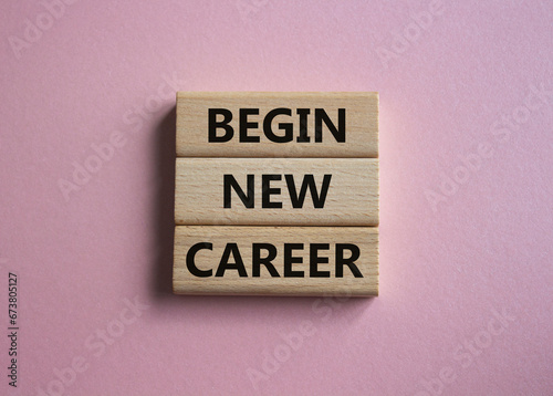 Begin new career symbol. Concept word Begin new career on wooden blocks. Beautiful pink background. Business and Begin new career concept. Copy space