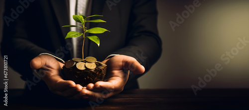 powerful symbol of wealth and investment as a man holds a flourishing plant growing from a bed of coins. Prosperity and financial growth in one captivating image.Copy text space